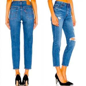 Levi’s Premium Wedgie High Rise Distressed jeans in a dark wash size 24.